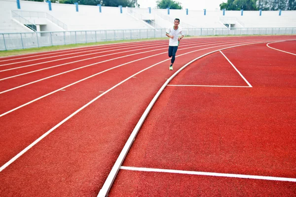 Przycięte zdjęcie Runner konkurencji działa — Zdjęcie stockowe