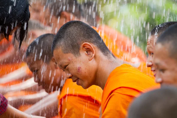 Water pouring to hands monk in Songkran festival on april 13,201 — Stock Photo, Image