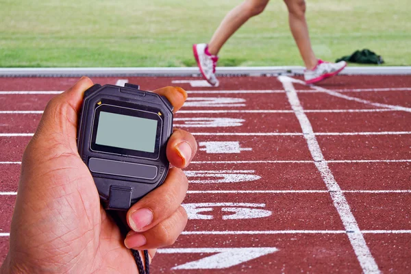 Bijgesneden afbeelding van loper op concurrerende uitvoeren — Stockfoto