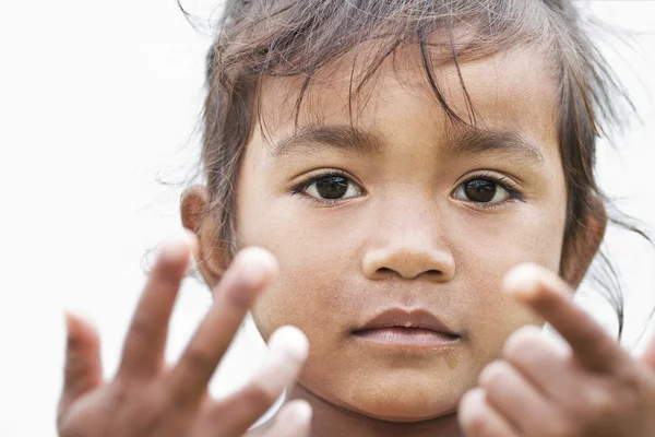 Closeup portrait of young asian woman praying — Stock Photo, Image