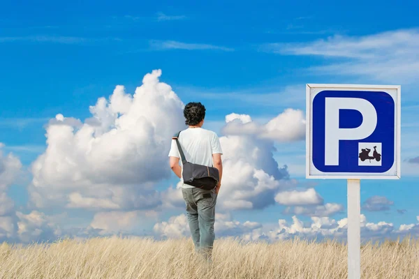 Young man walking alone — Stock Photo, Image