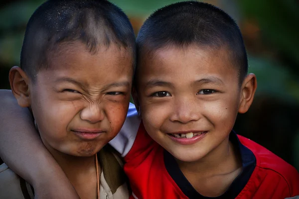 Two little friends hugging each other — Stock Photo, Image