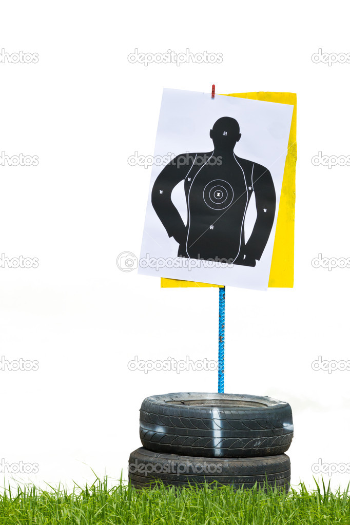 hand with gun shooting target