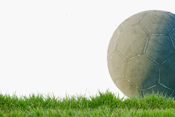 Old used football or soccer ball on cracked asphalt — Stock Photo, Image