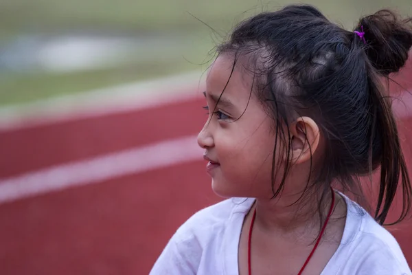 Cheerful girl in sports stadium — Stock Photo, Image