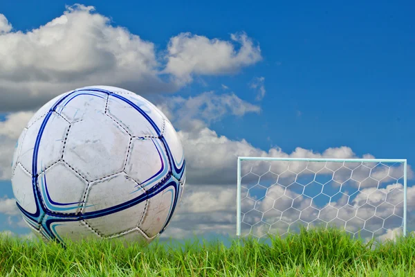 Goalpost net detail with green grass blur in background sports c — Stock Photo, Image