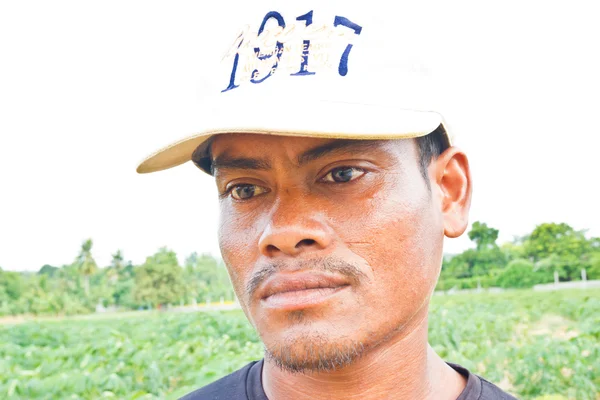 Man gardening in farm smiling — Stock Photo, Image