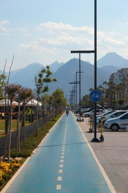 Antalya, Turkey - May 16, 2022: View of Konyaalti beach, one of the two main beaches of Antalya, located in the western part of the city.