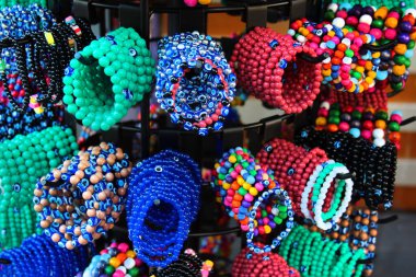 Hand bracelets and souvenirs on display at a street market in Antalya, Turkey