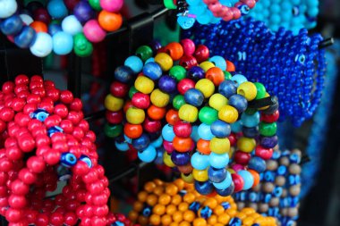 Hand bracelets and souvenirs on display at a street market in Antalya, Turkey