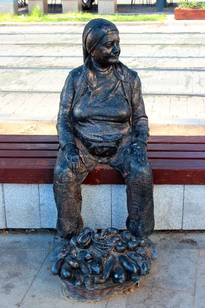Antalya, Turkey - August 22, 2022: Statue of an old woman selling egg-plants in central part of Antaly