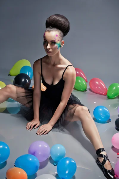 Beautiful dancer girl with balloons — Stock Photo, Image