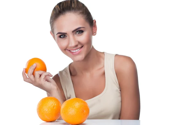 Close-up portrait of happy young woman with juice on white backg — Stock Photo, Image