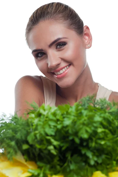 F gelukkig jonge vrouw met bundel kruiden (salade) in handen op wit — Stockfoto