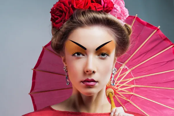 Fashion asian woman wearing traditional japanese red kimono wit — Stock Photo, Image