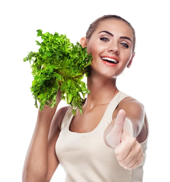 Woman with bundle herbs (salad). Concept vegetarian dieting - he — Stock Photo, Image