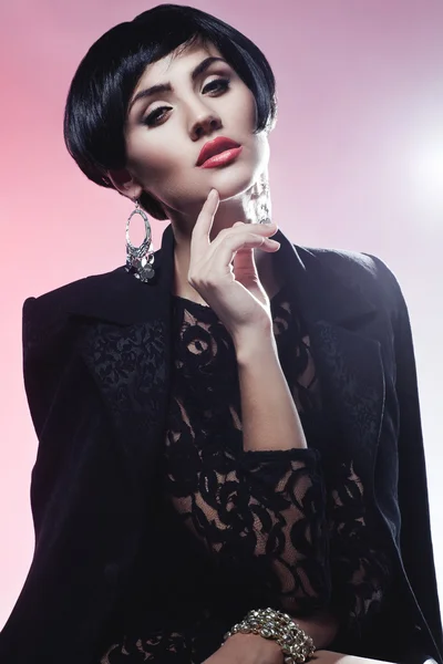 Sexy Fashionl Woman in Black Guipure Dress. Professional Makeup Stock Photo