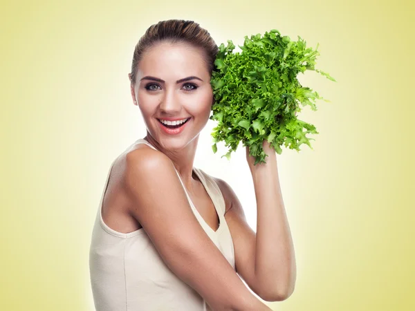 Woman with bundle herbs (salad). Concept vegetarian dieting — Stock Photo, Image