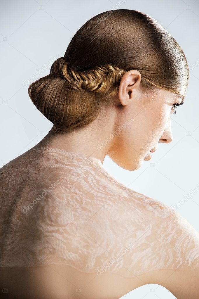 Portrait of woman in Wedding dress. Professional makeup and hairstyle