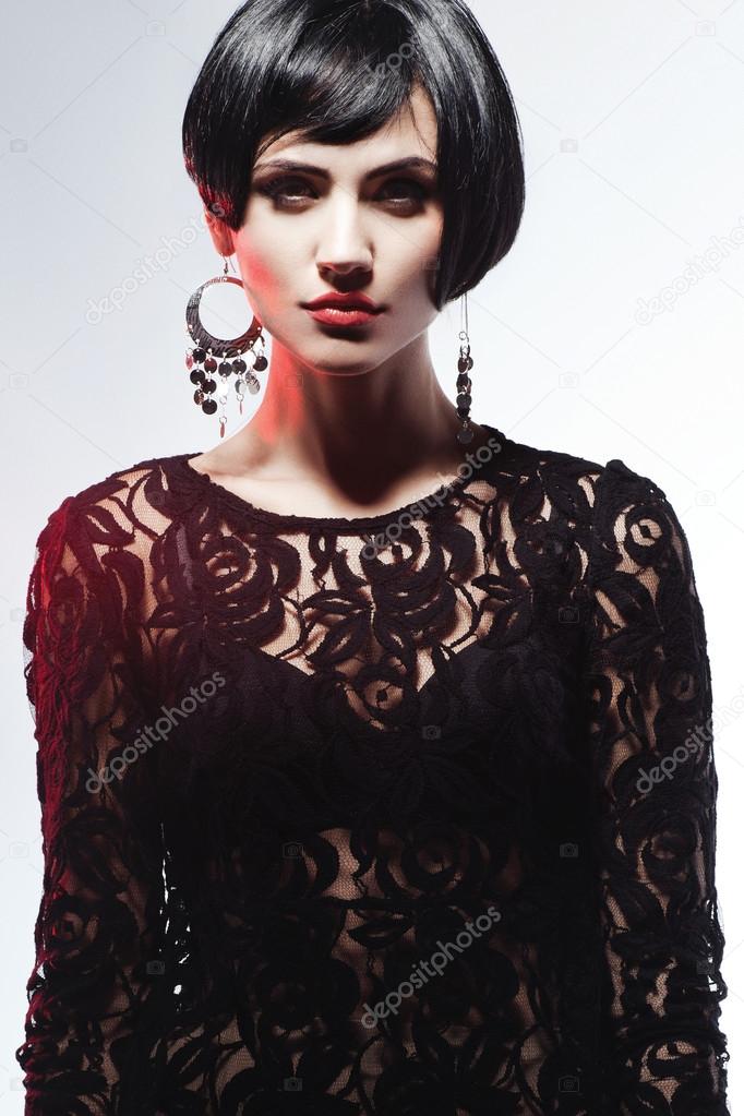 Sexy Fashional Woman in Black Guipure Dress.