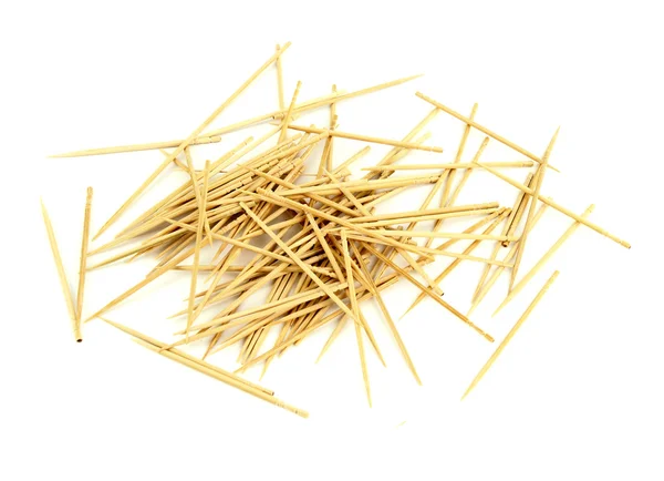 Many chaotic scattered toothpicks, isolated on white — Stock Photo, Image