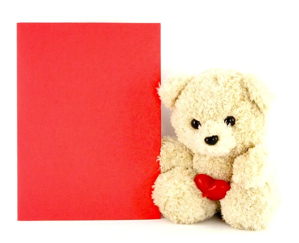 Nallebjörn leksak med ett tomt kort, isolerad på vit bakgrund — Stockfoto