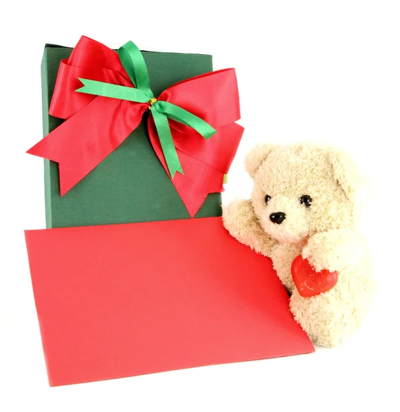 Teddy bear and card and gift on white background — Stock Photo, Image