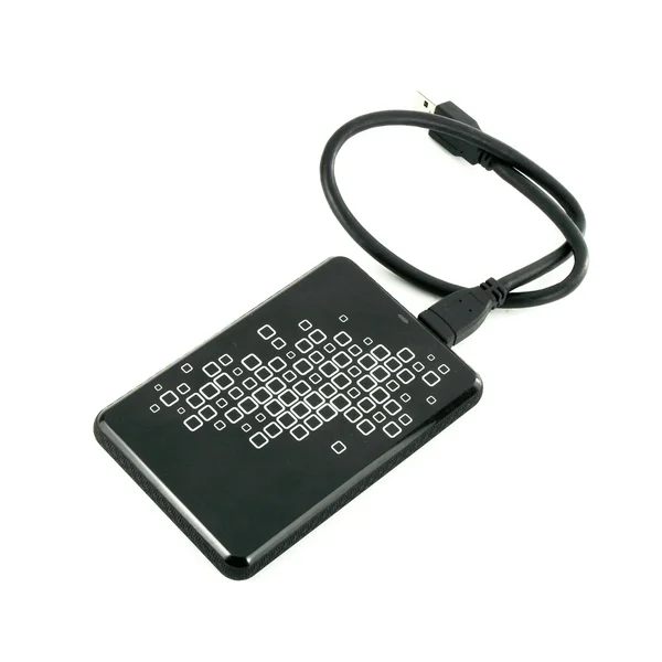 Tragbare externe Festplatte mit USB-Kabel auf weißer Festplatte — Stockfoto