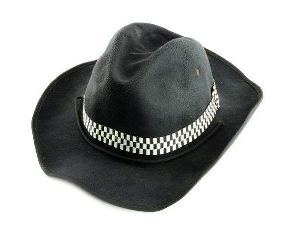 하얀 바탕에 검은 모자 만붙어 있다 — 스톡 사진