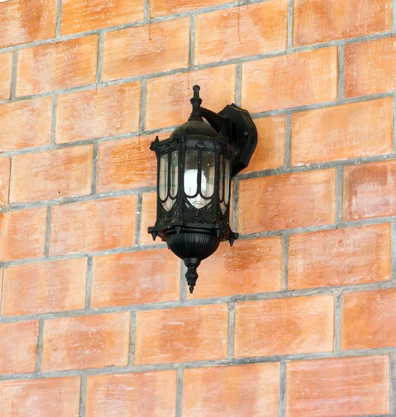 Lamp on texture brick wall — Stock Photo, Image