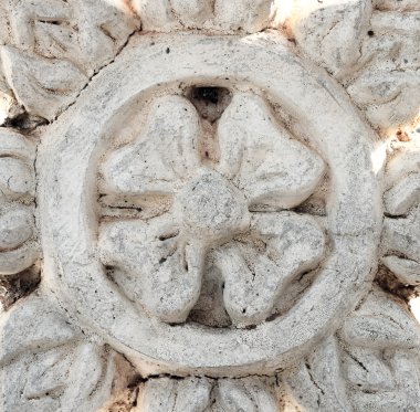 steen gesneden buddha bloem