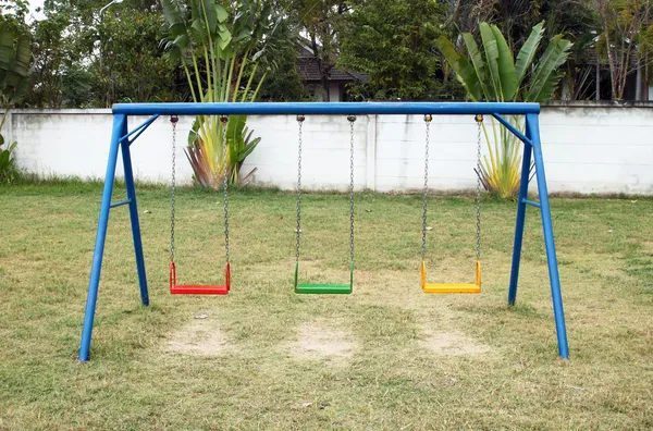 Balanço definido no parque infantil — Fotografia de Stock