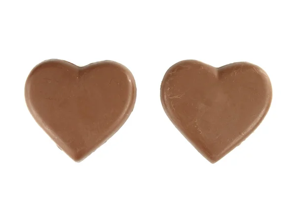 Шоколадная форма сердца на белом фоне — стоковое фото