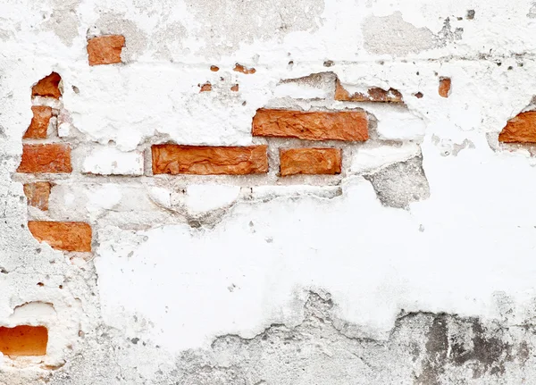 An old worn down red brick wall — Stock Photo, Image