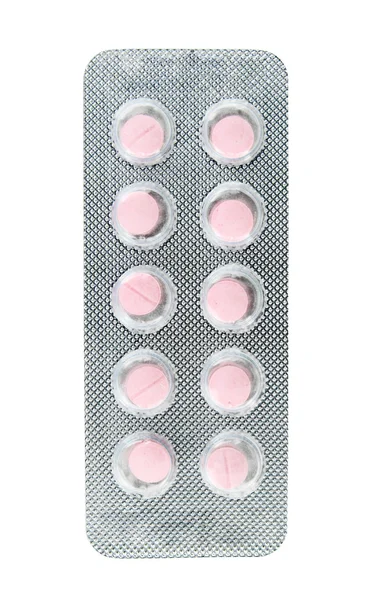 Pakke med rosa piller på hvit – stockfoto