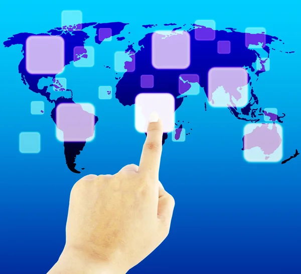 Hand pushing button on a touch screen interface with world map — Stock Photo, Image