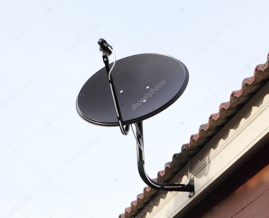 Black satellite antenna dish on the roof
