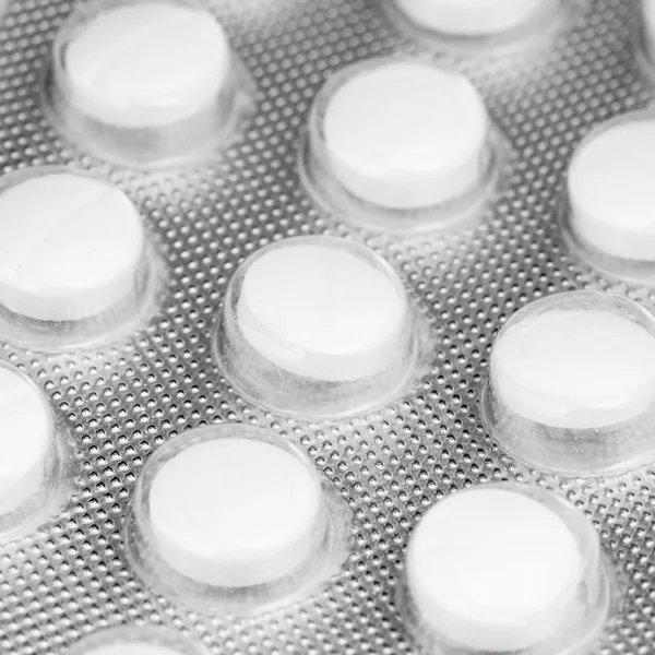 Confezione di pillole bianche — Foto Stock