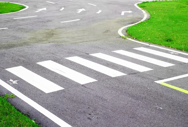 Zebra way on the asphalt road surface — Stock Photo, Image