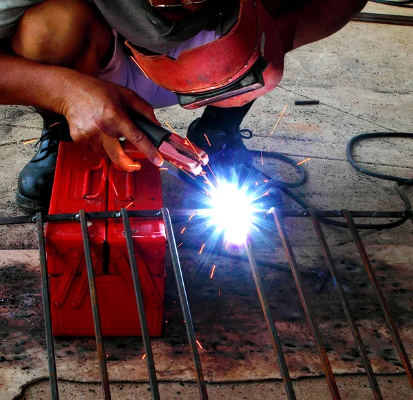 Electric welding connecting square bar — Stock Photo, Image