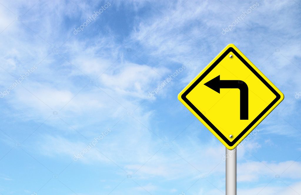 Road Sign - Left Turn Warning with blue sky blank for text