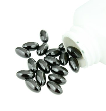 siyah beyaz bir hap şişe hap