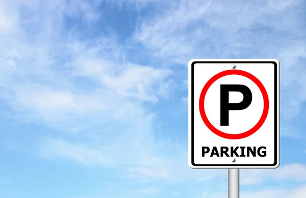 Teken parkeren over blauwe hemel — Stockfoto