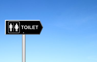 tuvalet işareti mavi gökyüzü ile