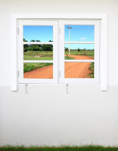 Window with soil curve road view — Stock Photo, Image