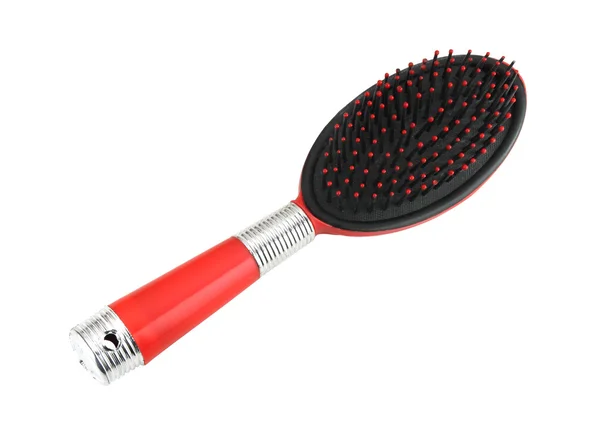 Escova de cabelo vermelha — Fotografia de Stock