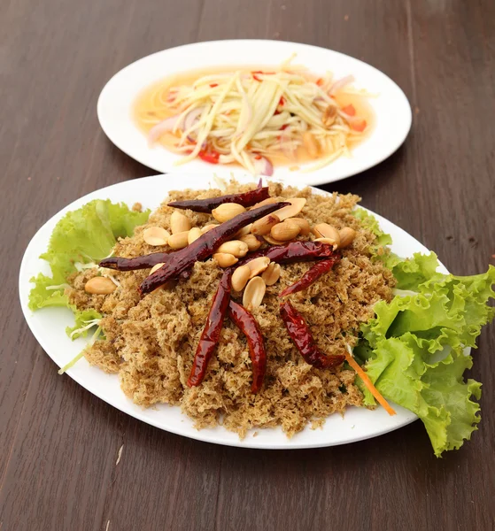 Crispy catfish salad with green mango — Stock Photo, Image