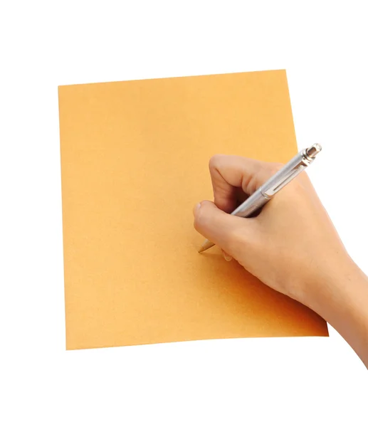 Hand with pen writing on the envelope — Stock Photo, Image