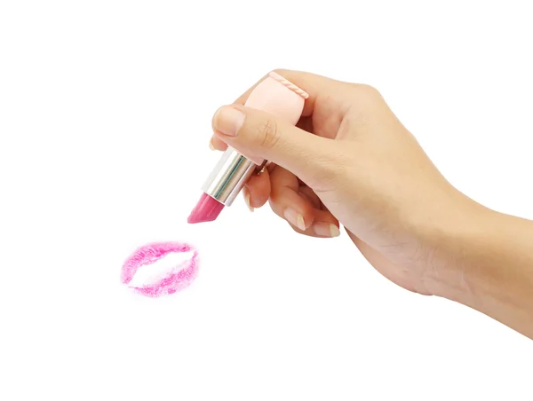 Hand holding lipstick with a kiss — Stock Photo, Image