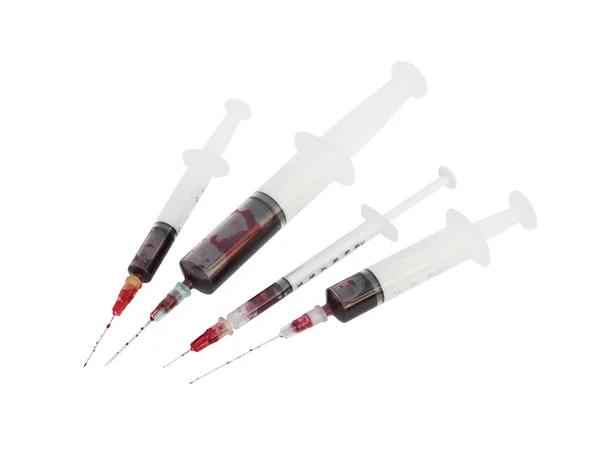Set of syringe with blood isolated on white backgroune — Stock Photo, Image